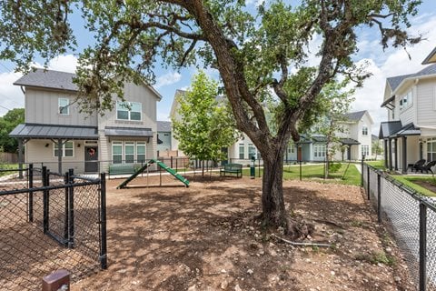 the preserve at ballantyne commons dog park with playground and trees